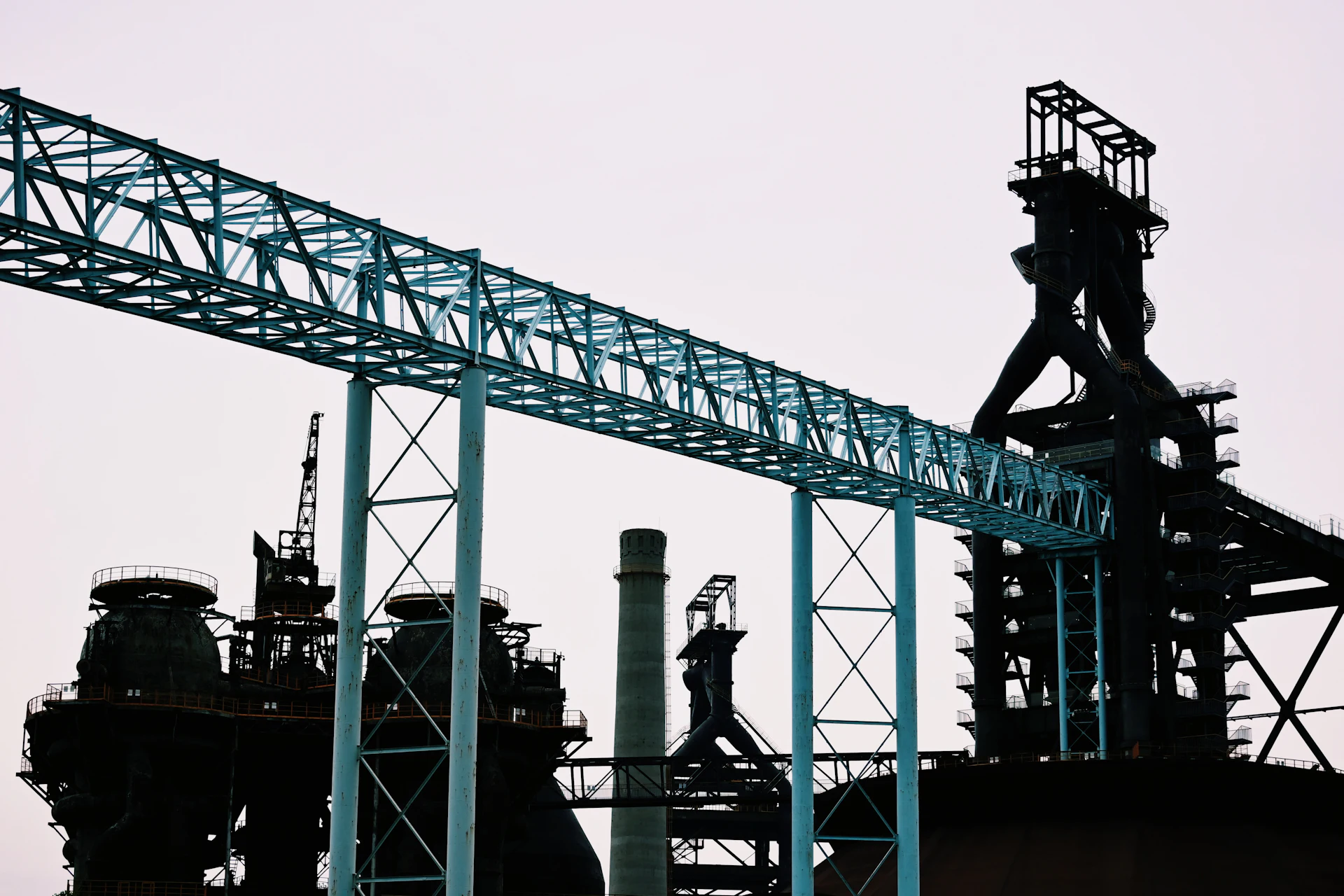 Conveyor structure silhouetted at dusk