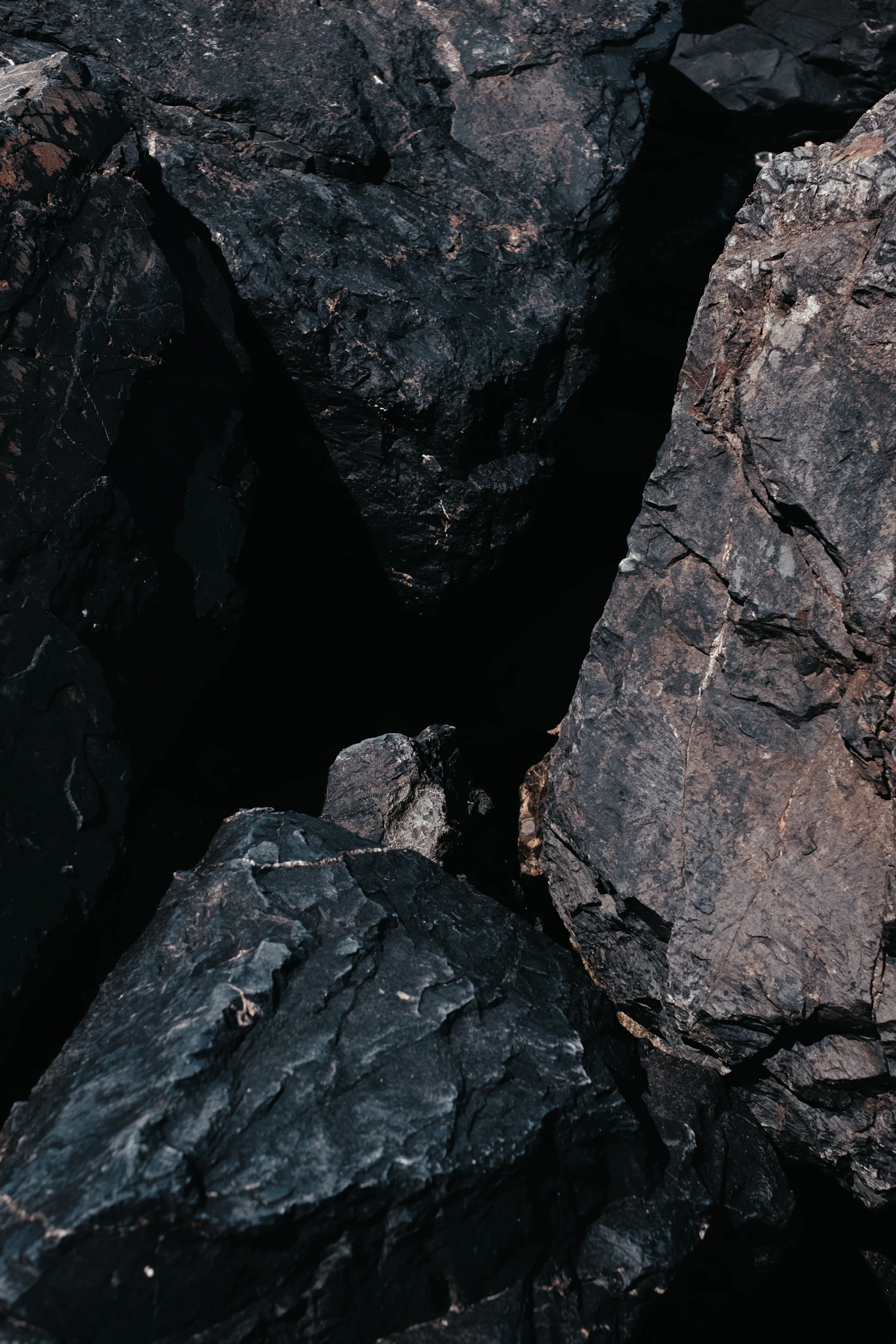 Dark mineral lumps awaiting processing
