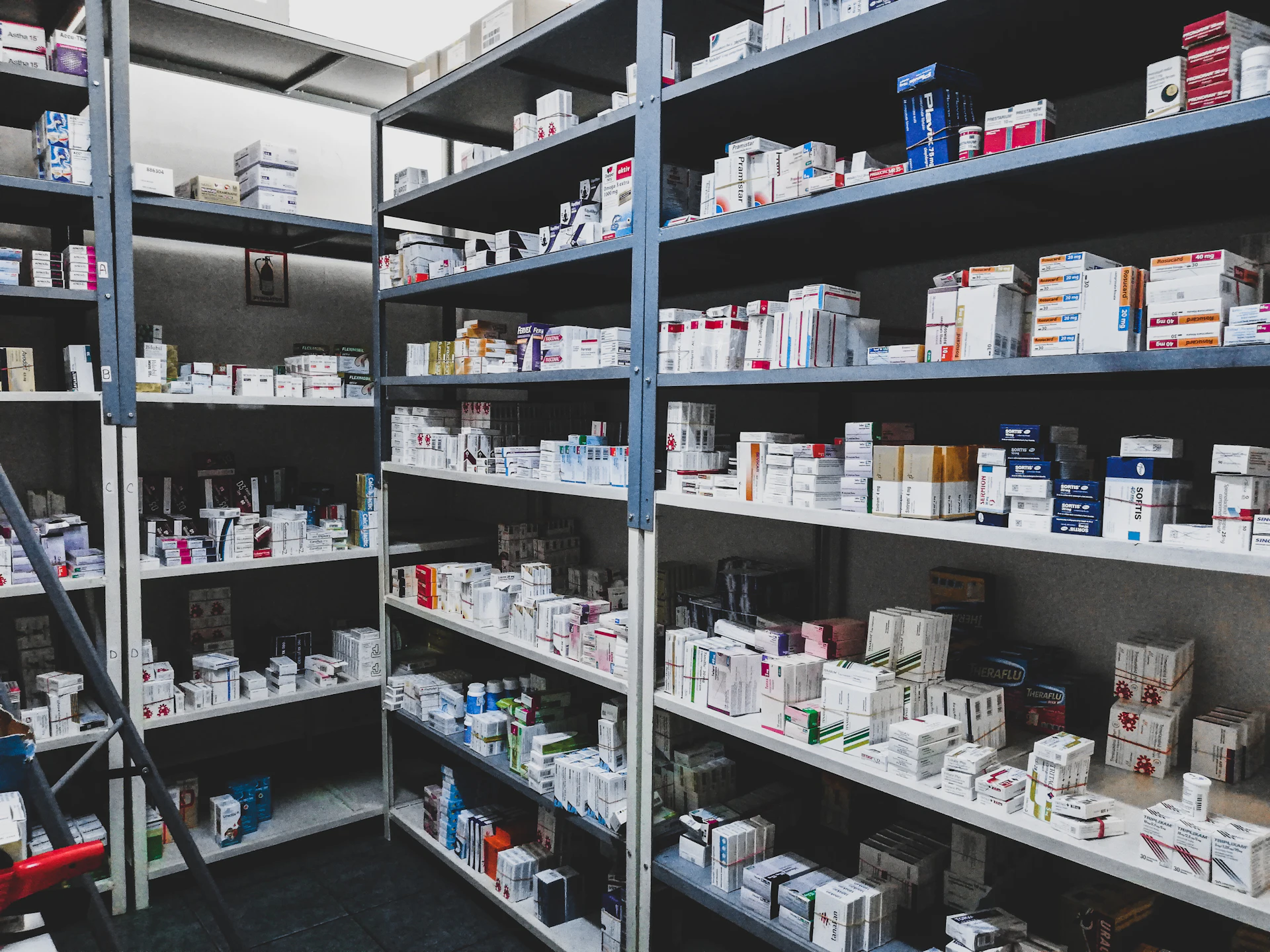 Dispensary shelving stocked with medicines