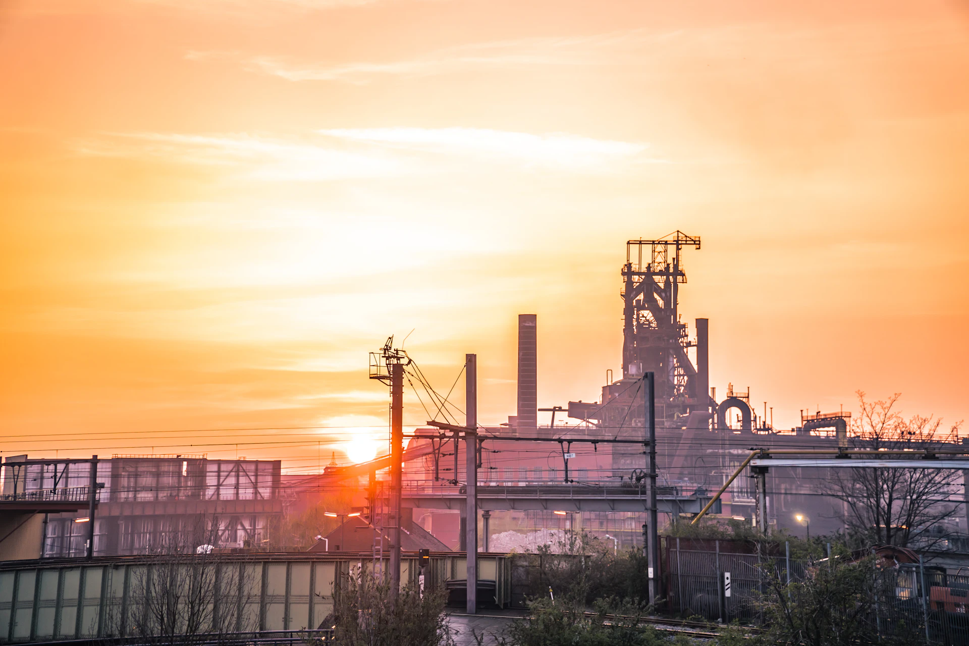 Works silhouetted against the evening sky