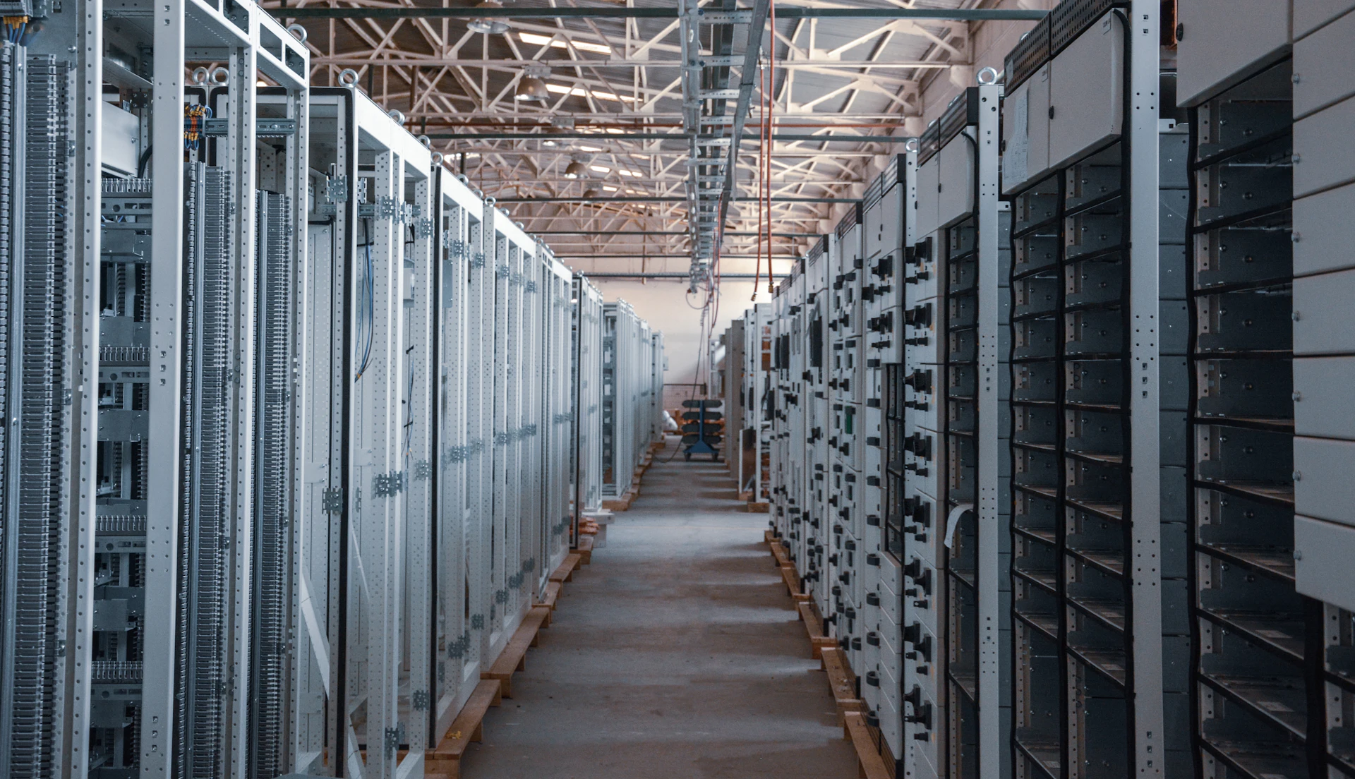 Aisle of equipment racks in a data centre